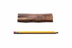 Top-down of Monster USA 5–7 inch bully stick showing meat texture and size with a pencil for scale on white background