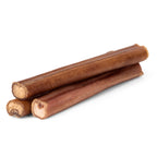 Angled view of three hickory-smoked bully sticks showing cross-sections and brown exterior on white background