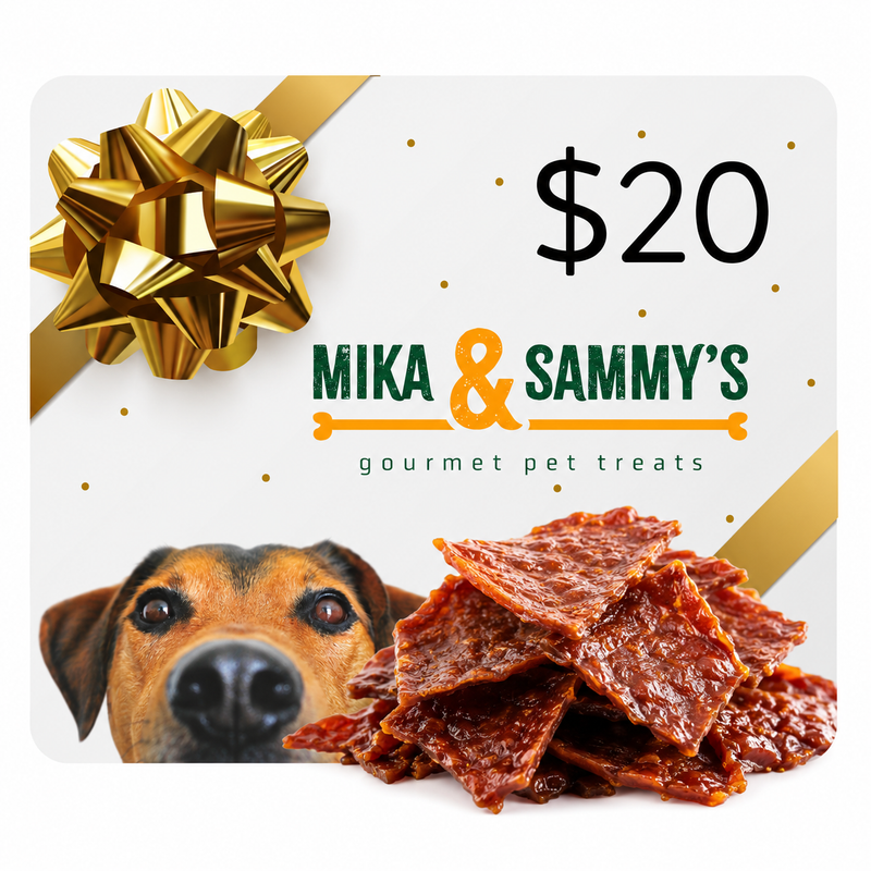 Front view of 20 dollar gift card and 5oz smoked chicken jerky showcasing Mika and Sammy’s logo, gold bow, dog peeking and jerky pile on white background