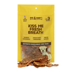 Front view of Kiss Me Fresh Breath dog treats showcasing dehydrated chicken breast jerky treats in a yellow package
