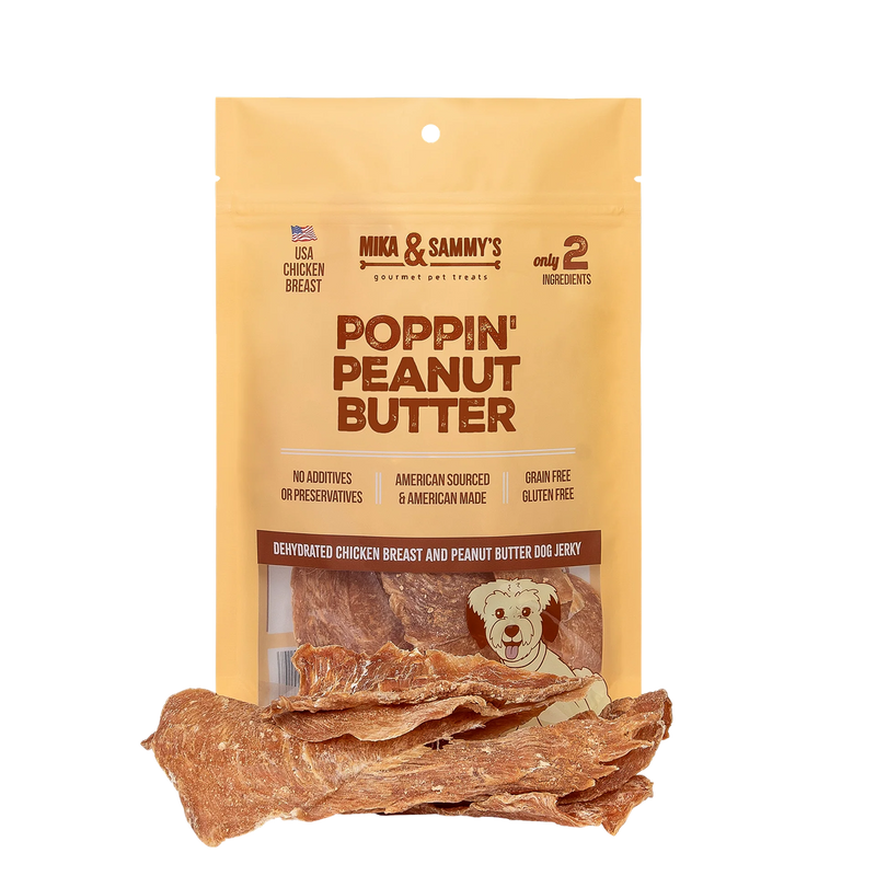 Front view of Poppin Peanut Butter dog jerky bag showcasing chicken breast and peanut butter treats on a plain background