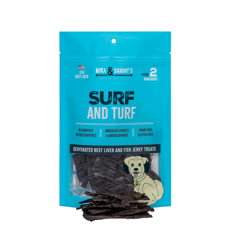 Front view of Surf and Turf dog treats showcasing blue packaging with beef liver and fish jerky treats on black background