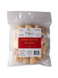 Front view of 5oz Peanut Butter Yak Puffs bag with red label and Mika & Sammy’s logo in clear pouch on white background