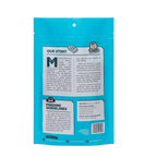 Back view of Surf and Turf dog treats package showcasing the Our Story panel and feeding guidelines with a black background